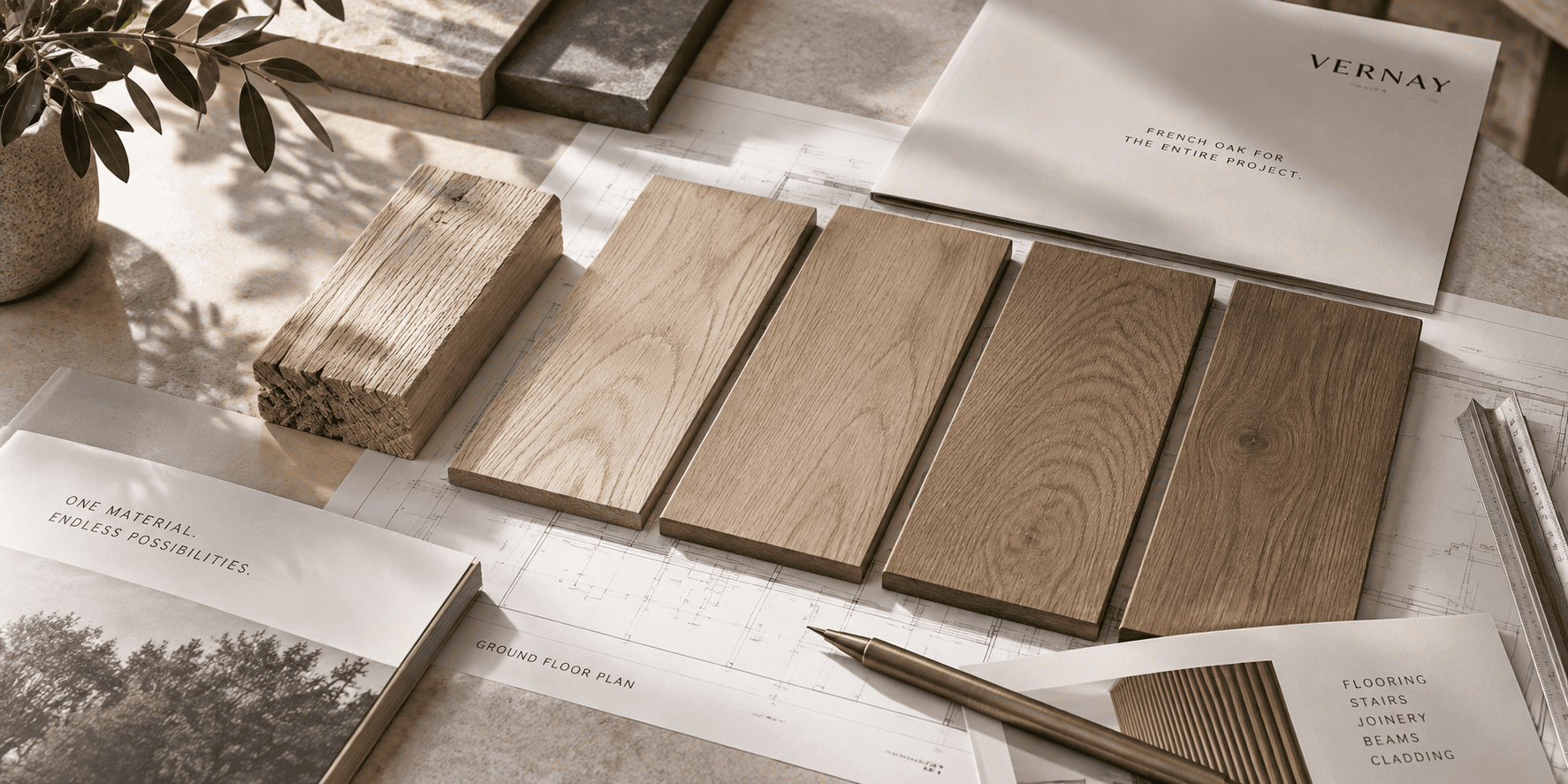 French Oak samples and finishes displayed with architectural plans and Vernay specification materials.